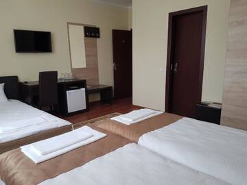 Фото номера Трехместный номер Отель Hotel New г. Бая-Маре 4