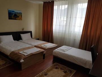 Фото номера Трехместный номер Отель Hotel New г. Бая-Маре 5