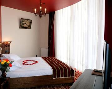 Фото номера Двухместный номер Делюкс с 1 кроватью Отель Castel Transilvania г. Бая-Маре 13
