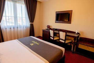 Фото номера Двухместный номер Делюкс с 1 кроватью Отель Magus Hotel г. Бая-Маре 8