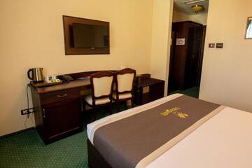 Фото номера Двухместный номер Делюкс с 1 кроватью Отель Magus Hotel г. Бая-Маре 10