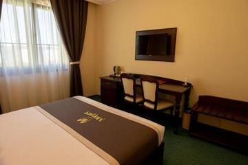 Фото номера Двухместный номер Делюкс с 1 кроватью Отель Magus Hotel г. Бая-Маре 11