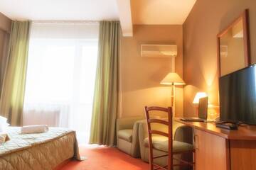 Фото номера Двухместный номер с 1 кроватью Отель Hotel Rivulus г. Бая-Маре 6